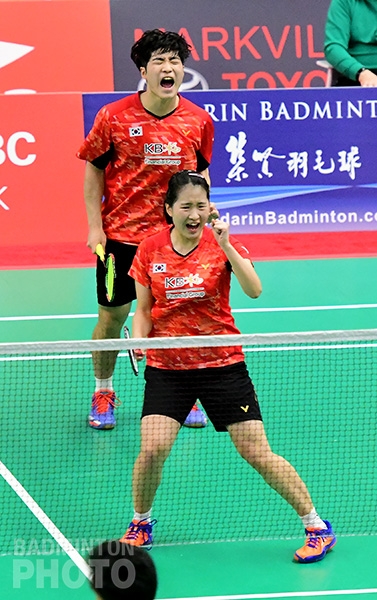 Wang Chan and Jeong Na Eun of Korea, after beating Indonesia's Ghifari Anandaffa Prihardika and Lisa Ayu Kusumawati  30-28